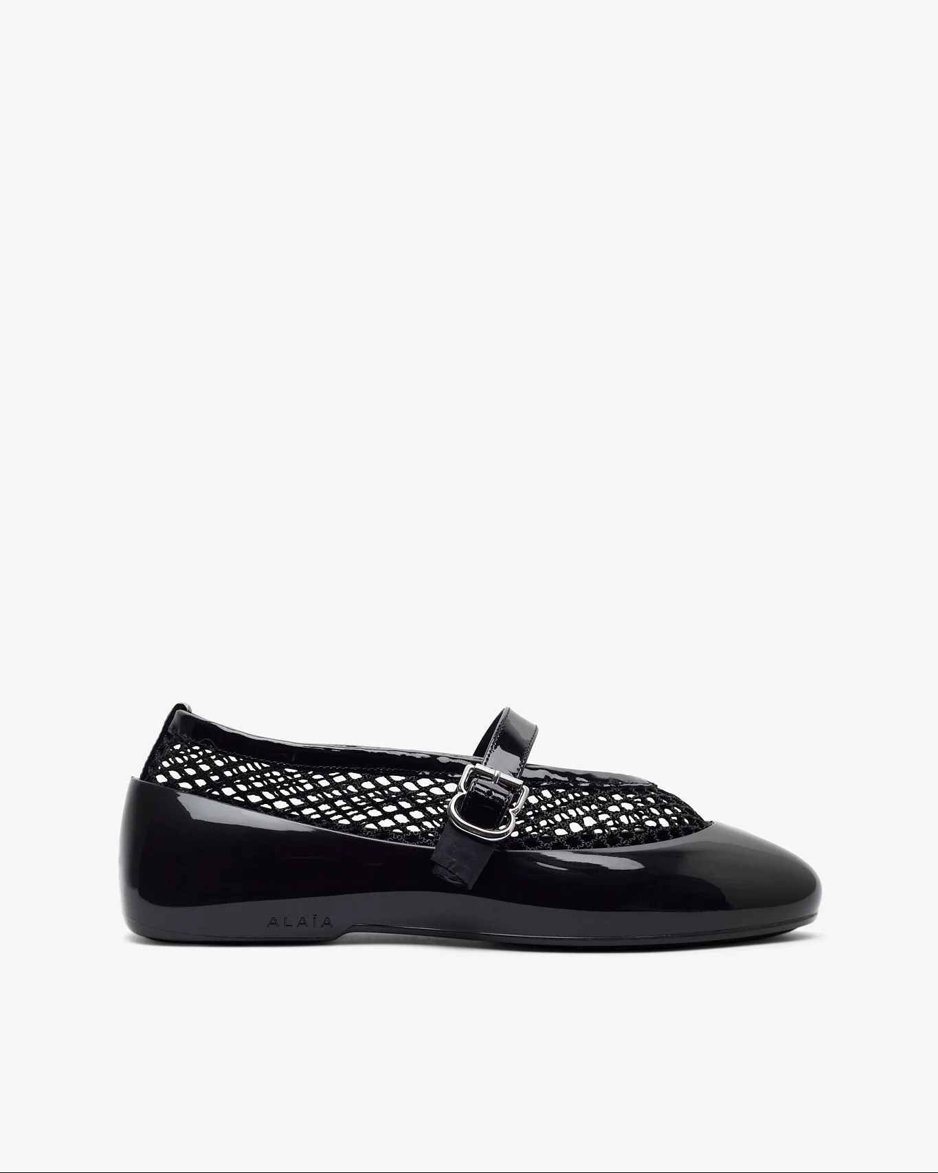 Black rubber ballet flats