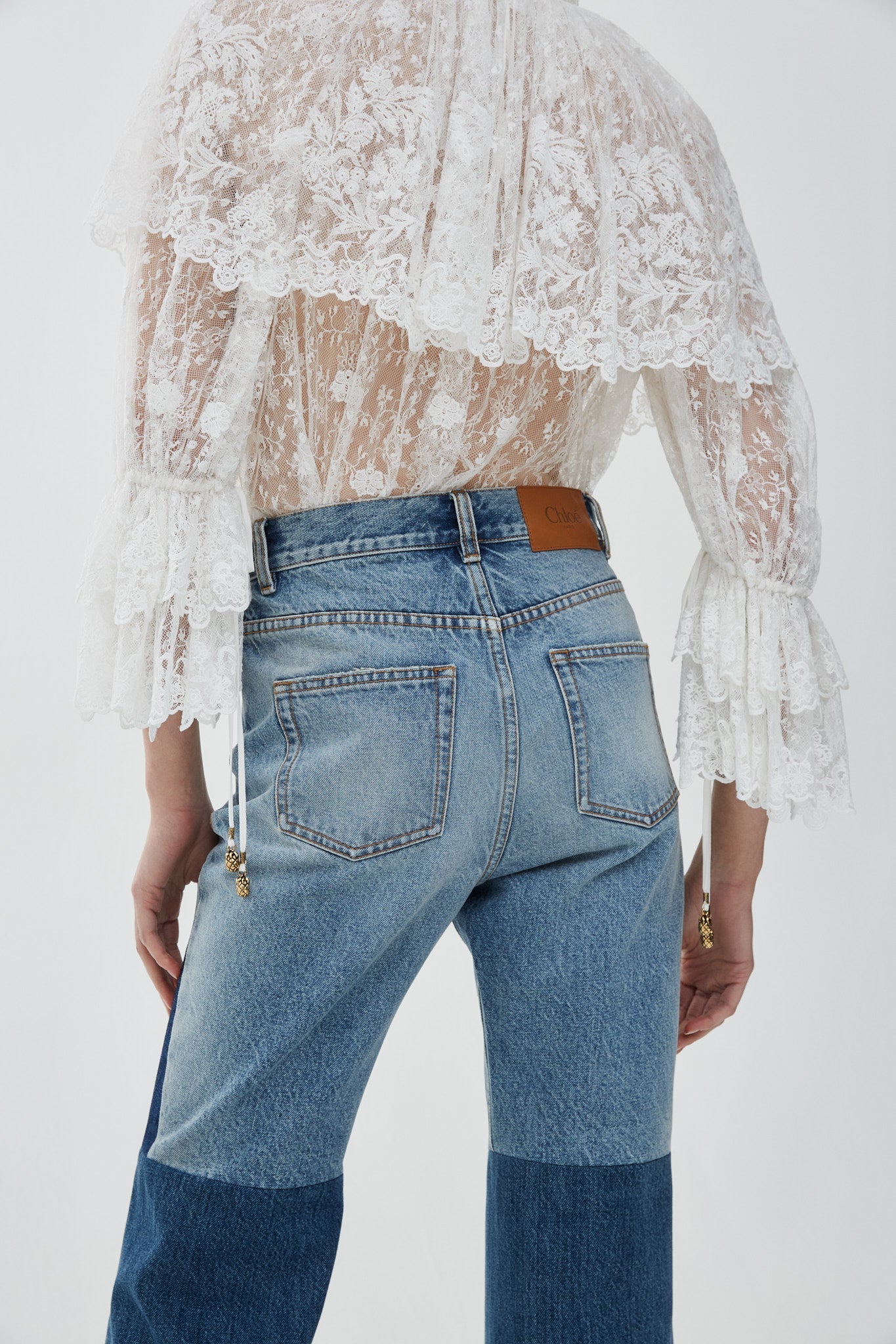Flared patchwork jeans in denim - Image 3