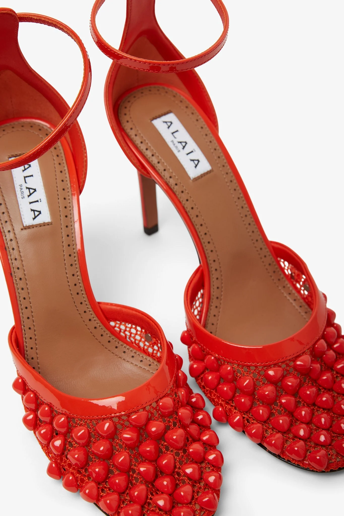 Red studded fishnet pumps - Image 4